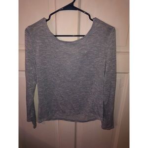 Light blue knit long sleeved cross caged back